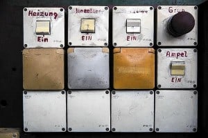 Picture shows pannel of switches inside exhibition project "ADN Guard House" in Berlin