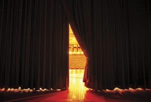 Moving Stage Curtains, as seen as Actors on Stage.